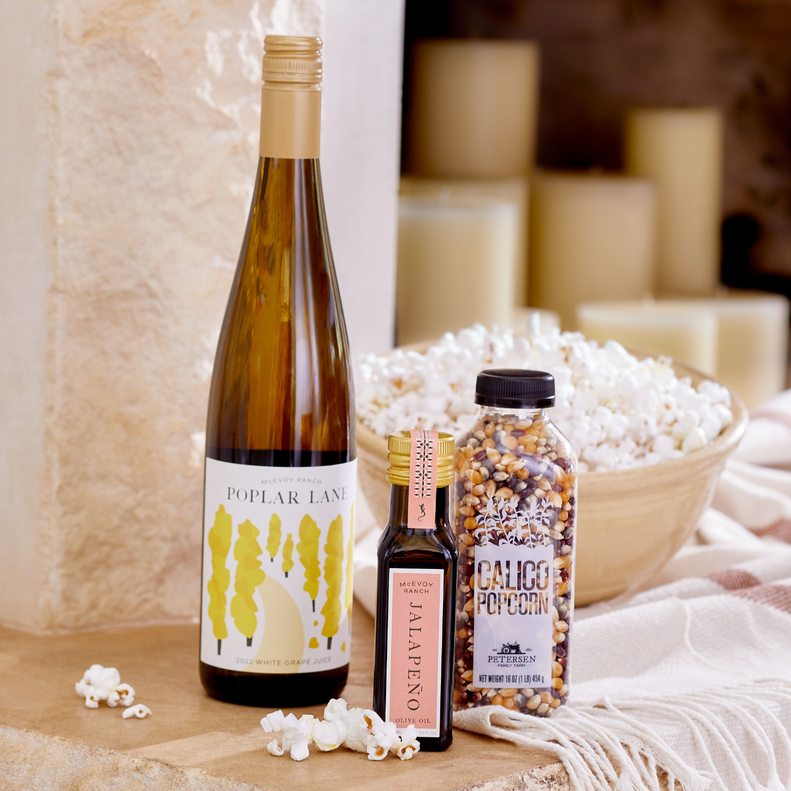 https://www.mcevoyranch.com/cdn/shop/files/McEvoy-Ranch-Movie-Night-Popcorn-Gift-Set-1600x1600-Environmental_2000x.png?v=1692046830